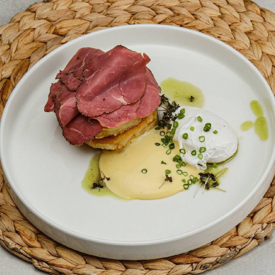 Crepes with pastrami and poached egg