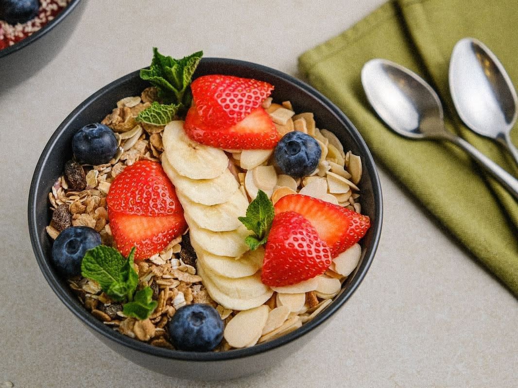 Smoothie bowl with almond flakes